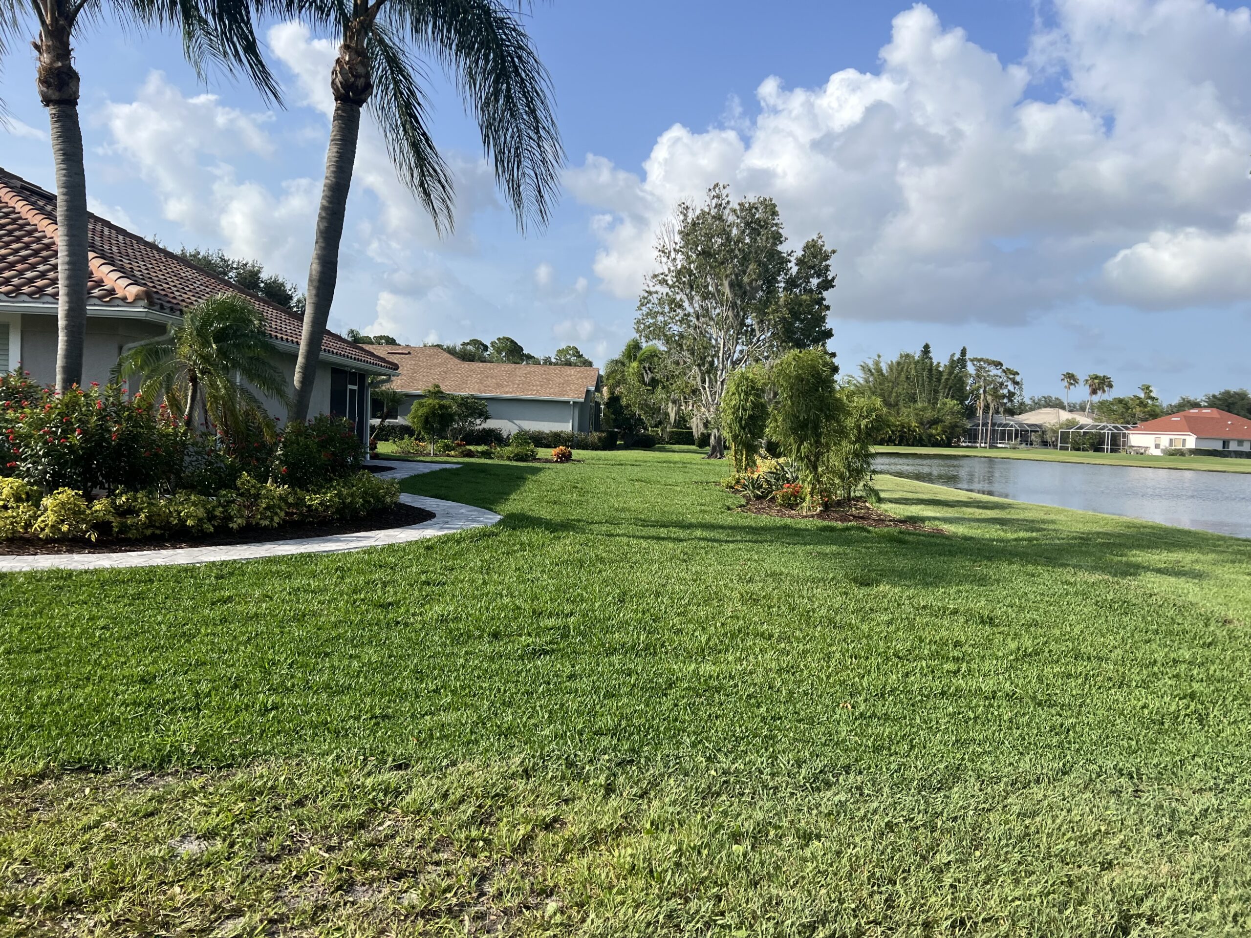 Restoration Sod crew installing fresh sod on a residential lawn